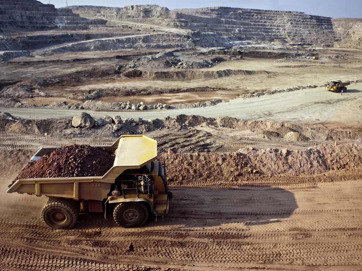 kongói bányászat, kongóibányászat, Kongó, Kongó bányászat, Kongóbányászat,
The Luiswishi open mine, owned by the Gecamines since September 25th, 2012, when it forced purchase Entreprise General Malta Forrest's 60% share, produces 12,000 tons of copper annually and about 4,000 tons of cobalt. This is about 8% of world cobalt production.
© Gwenn Dubourthoumieu / eyevine
Contact eyevine for more information about using this image:
T: +44 (0) 20 8709 8709
E: info@eyevine.com
http:///www.eyevine.com The Copper Eaters by Gwenn Dubourthoumieu
The "copper belt" situated in the Southeast of the Democratic Republic of the Congo, holds 34 % of the world reserves of cobalt and 10 % of the world copper reserves. Early 2011, the copper price reached its historic record: $10000 US per ton on the London Metal Exchange. Taking advantage of this unprecedented boom and of the liberalization of the mining sector, immense fortunes are made, shielded behind an opaque management of the revenues. Until now, this wealth has benefited only a minority of wheeler-dealers close to the power. Paradoxically, the situation of the some 200000 "creuseurs" (artisan miners) who make up the majority of the workers has worsened. This sharp rise in prices has attracted multinational companies that chased thousands of them away from the richest sites. Only 25 % of this non-qualified workforce were re-employed by the formal sector. The others make do with the exploitation of the backfills or the waste water of the industries, still decreasing their life expectancy as well as their income. The revolts are not rare but are violently repressed.