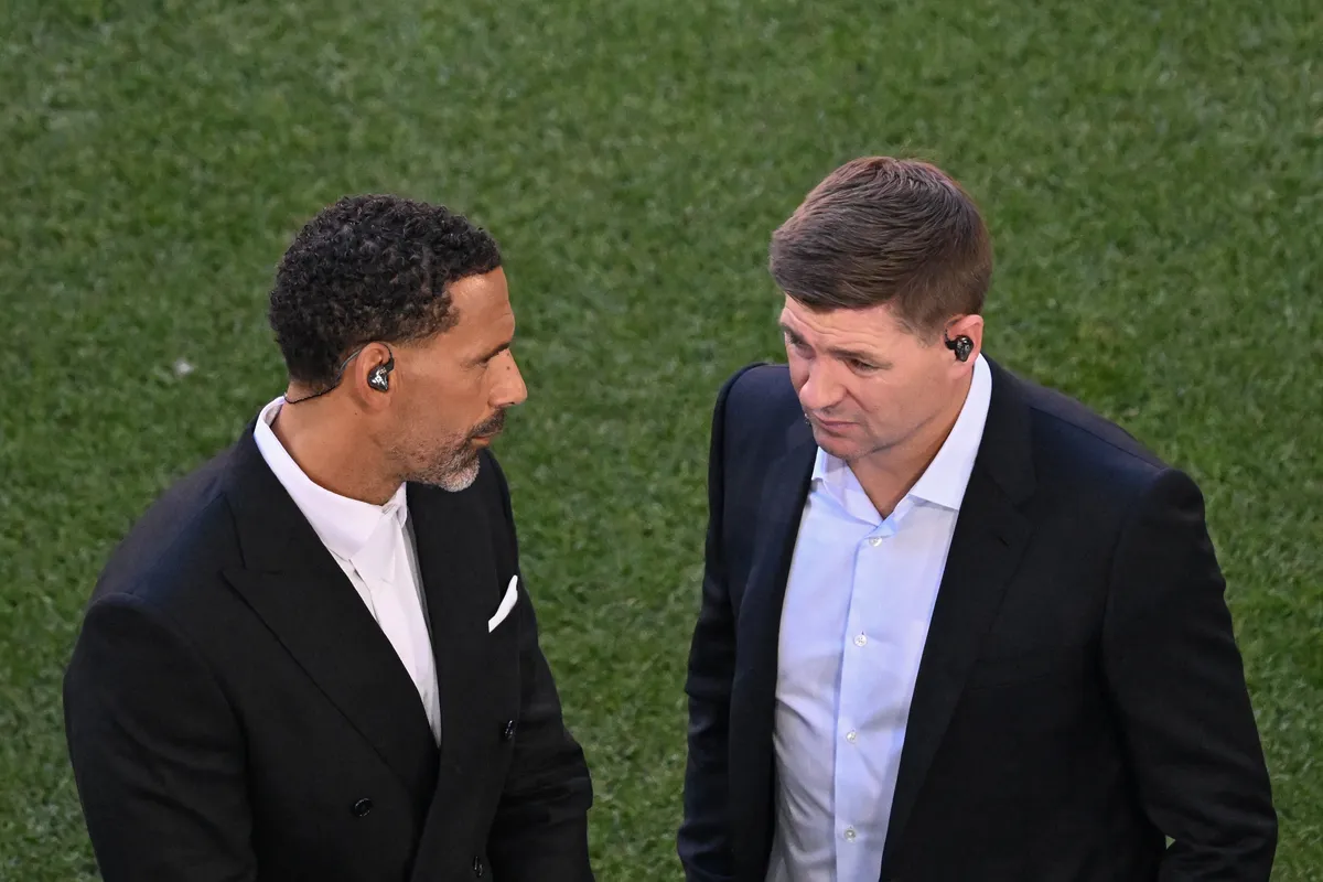 Former English defender Rio Ferdinand (L) and former English midfielder Steven Gerrard work for tv prior to the UEFA Champions League final football match between Inter Milan and Paris Saint-Germain (PSG) in Munich, southern Germany on May 31, 2025. (Photo by Kirill KUDRYAVTSEV / AFP)