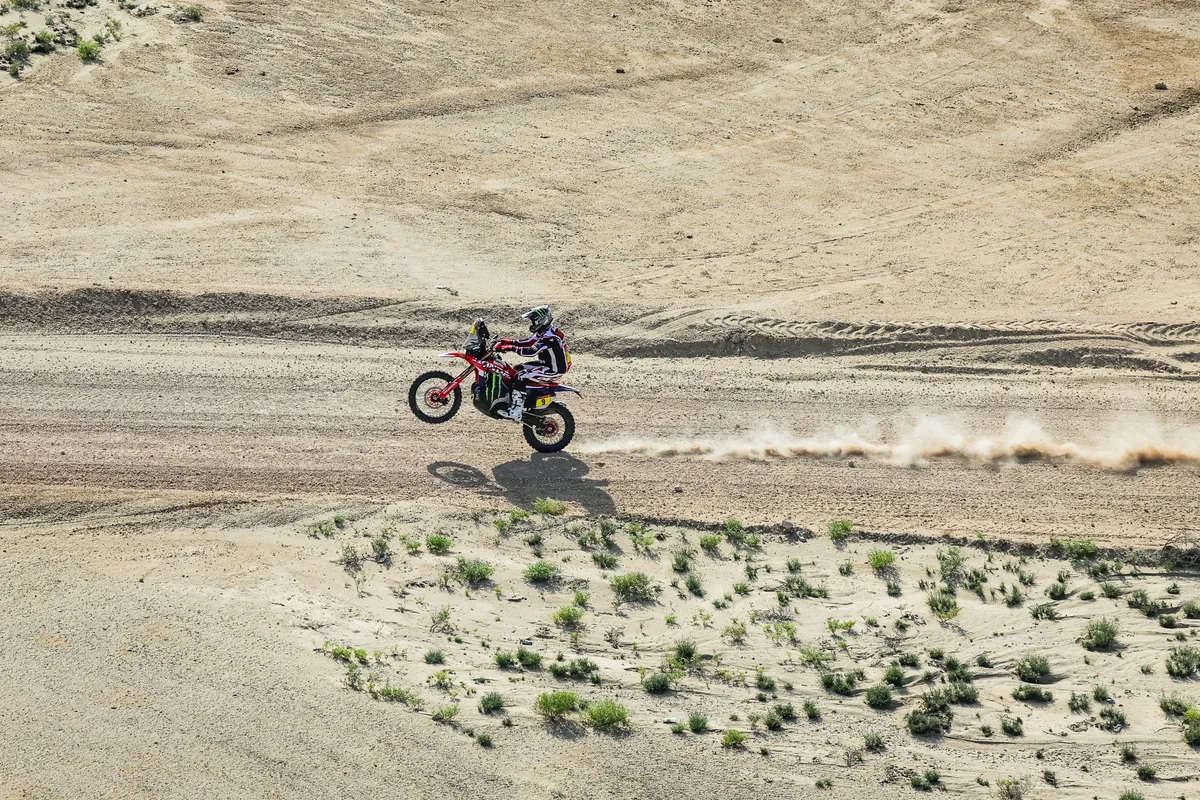 An aerial view shows US rider Ricky Brabec competing in the last Stage 13 of the 48th edition of the Dakar Rally 2026, between Yanbu and Yanbu, Saudi Arabia, on January 17, 2026. (Photo by Florent Gooden / POOL / AFP)