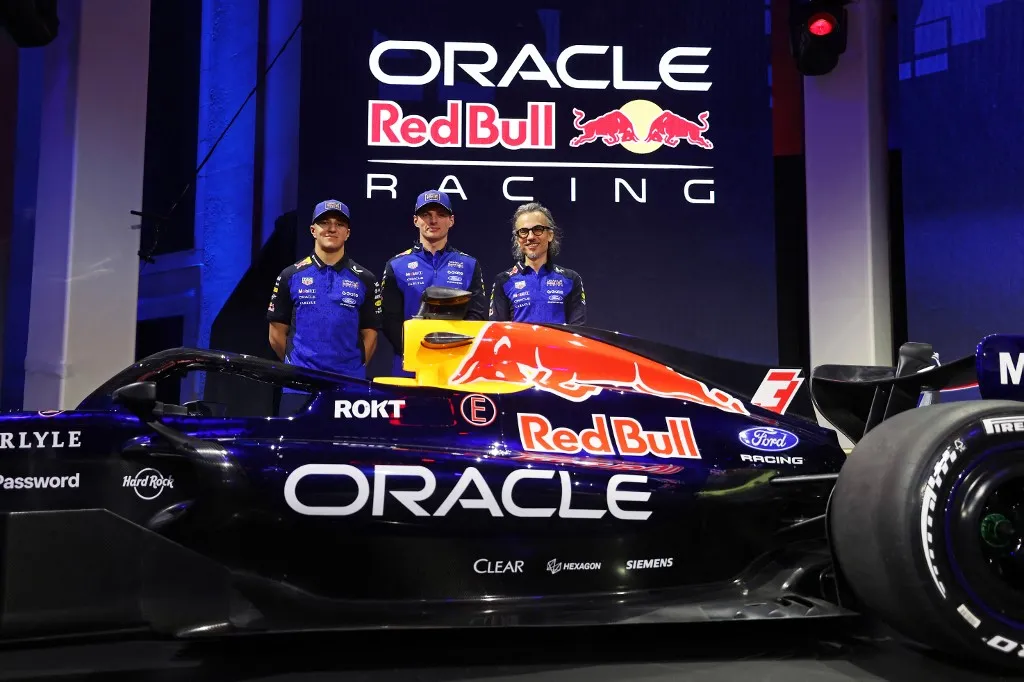 DETROIT, MICHIGAN - JANUARY 15: Isack Hadjar of France and Oracle Red Bull Racing, Max Verstappen of the Netherlands and Oracle Red Bull Racing and Laurent Mekies, Team Principal of Oracle Red Bull Racing unveil their 2026 livery during the Red Bull Racing season launch at Michigan Central Station on January 15, 2026 in Detroit, Michigan.   Mark Thompson/Getty Images/AFP (Photo by Mark Thompson / GETTY IMAGES NORTH AMERICA / Getty Images via AFP)