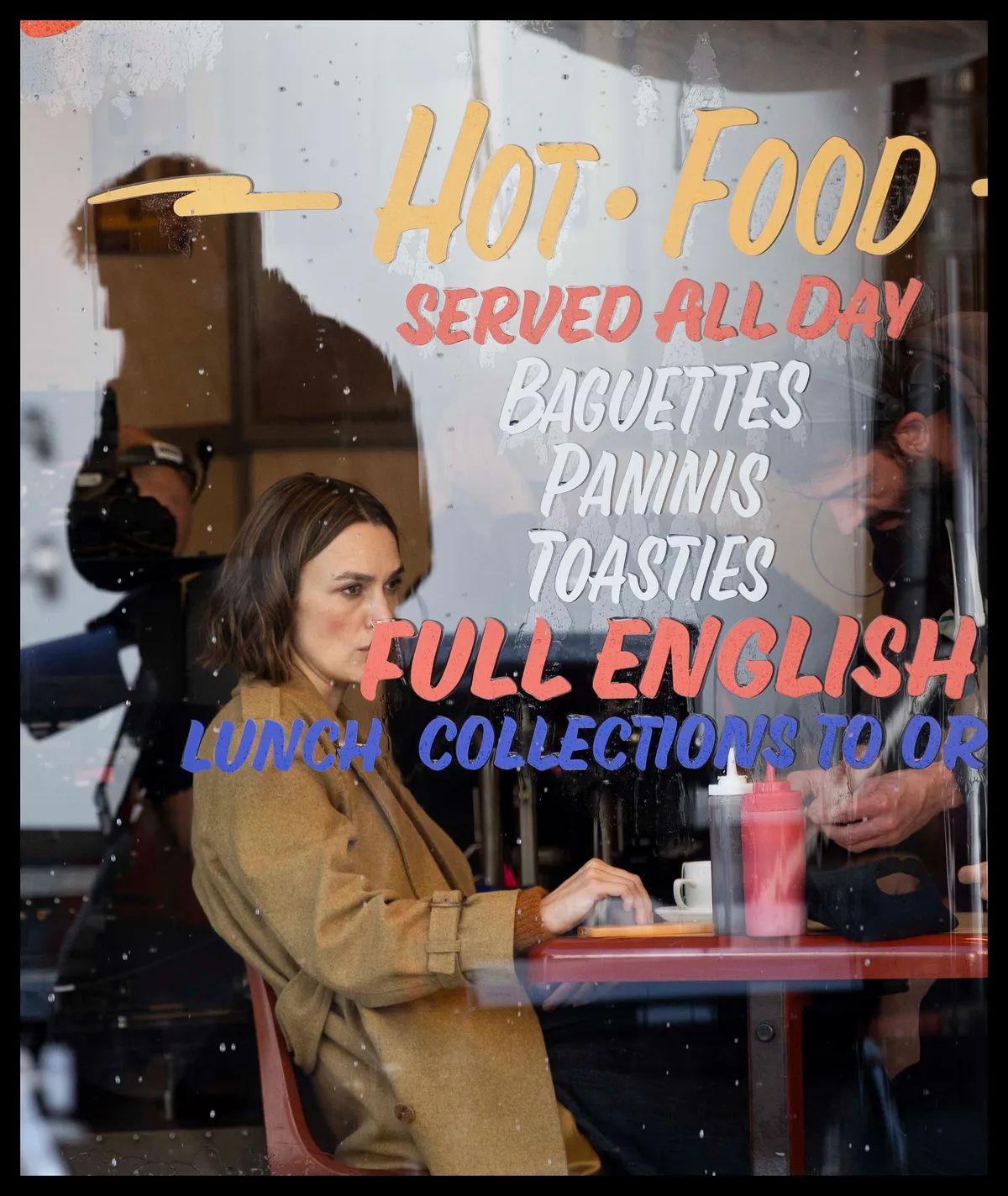 October 6, 2025, London, London, United Kingdom: Actress Kiera Knightley seen  filming  at a cafe near Charing Cross Station in London. It was thought the filming was for the new season of Black Doves. (Credit Image: © Stephen Lock/i-Images via ZUMA Press)