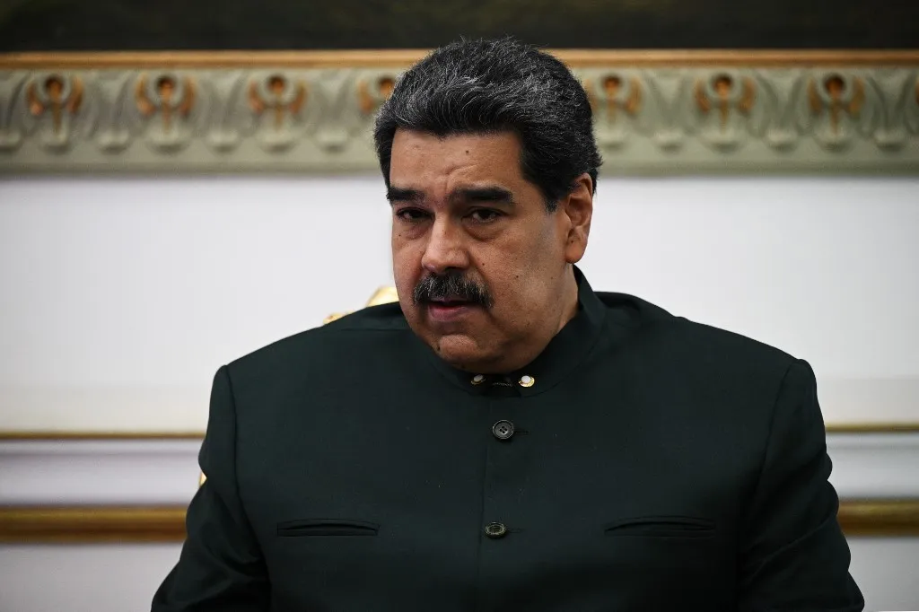 (FILES) Venezuela's President Nicolas Maduro attends a meeting with the Secretary General of the Organization of the Petroleum Exporting Countries (OPEC), Kuwaiti Haitham al-Ghais (out of frame), at the Miraflores presidential palace in Caracas, on September 14, 2022. Venezuela on January 3, 2026, demanded an emergency meeting of the UN Security Council to discuss the US military strikes on the country, amid uncertainty over the whereabouts of President Nicolas Maduro, after President Donald Trump said that US forces had captured the Venezuelan leader after launching a "large scale strike" on the South American country. (Photo by Federico Parra / AFP)