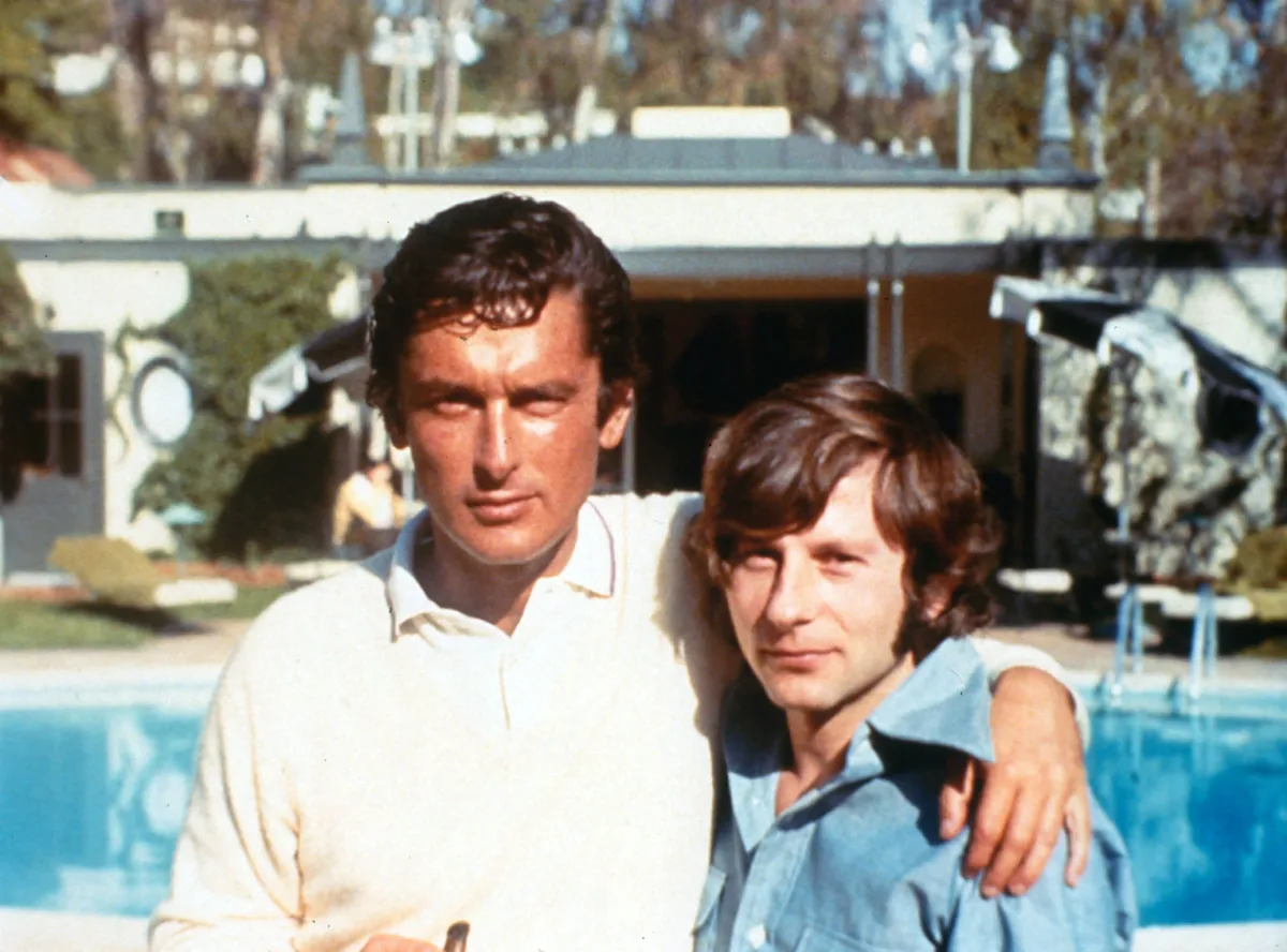 1974 ROBERT EVANS with ROMAN POLANSKI during the making of Chinatown.