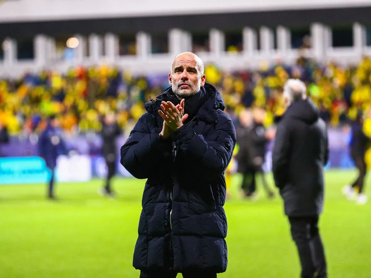 Manchester City's Spanish manager Pep Guardiola reacts after the UEFA Champions League, league Phase - day 7 football match between Bodoe/Glimt and Manchester City in Bodoe, Norway on January 20, 2026. (Photo by Mats Torbergsen / NTB / AFP) / Norway OUT