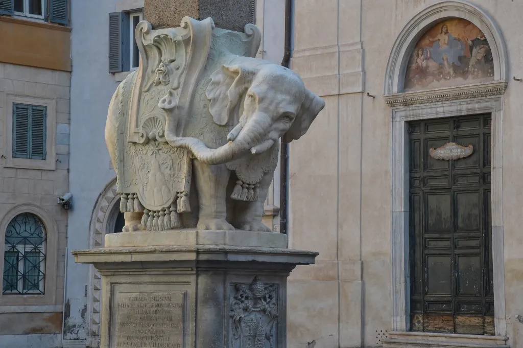 A picture shows the Elephant statue of Bernini with a tusk detached after an overnight incident, on 15 November, 2016 at Piazza della Minerva in Rome. Police are examining CC-TV footage in a bid to identify vandals who damaged one of the city's most famous pieces of public sculpture, Bernini's Elephant and Obelisk. The elephant was commissioned by the then pope, Alexander VII, to support an obelisk from ancient Egypt that had only recently been excavated. (Photo by ANDREAS SOLARO / AFP)