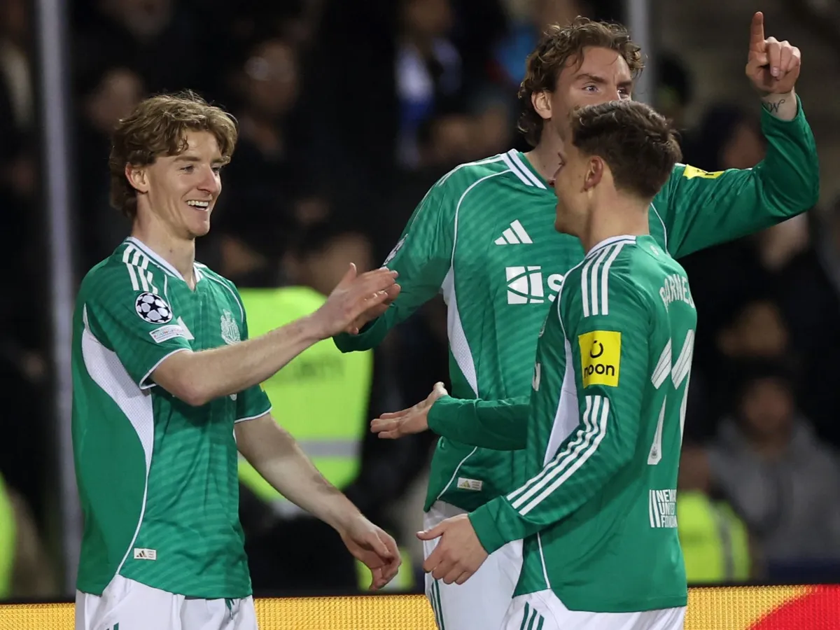 Newcastle United's English midfielder #10 Anthony Gordon celebrates with teammates after scoring the team's first goal during the UEFA Champions League knockout phase play-off first leg football match between Qarabag and Newcastle at the Tofiq Bahramov Republican Stadium in Baku on February 18, 2026. (Photo by Giorgi ARJEVANIDZE / AFP)