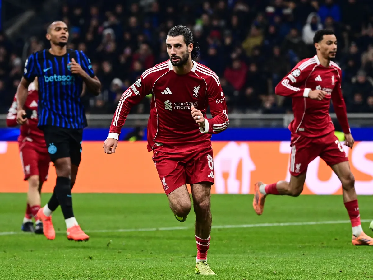 MILAN, ITALY - DECEMBER 9: Dominik Szoboszlai of Liverpool celebrates after scoring his team first goal during the UEFA Champions League football match Inter Milan vs Liverpool at San Siro Stadium in Milan, Italy on December 9, 2025 Piero Cruciatti / Anadolu (Photo by Piero Cruciatti / Anadolu via AFP)