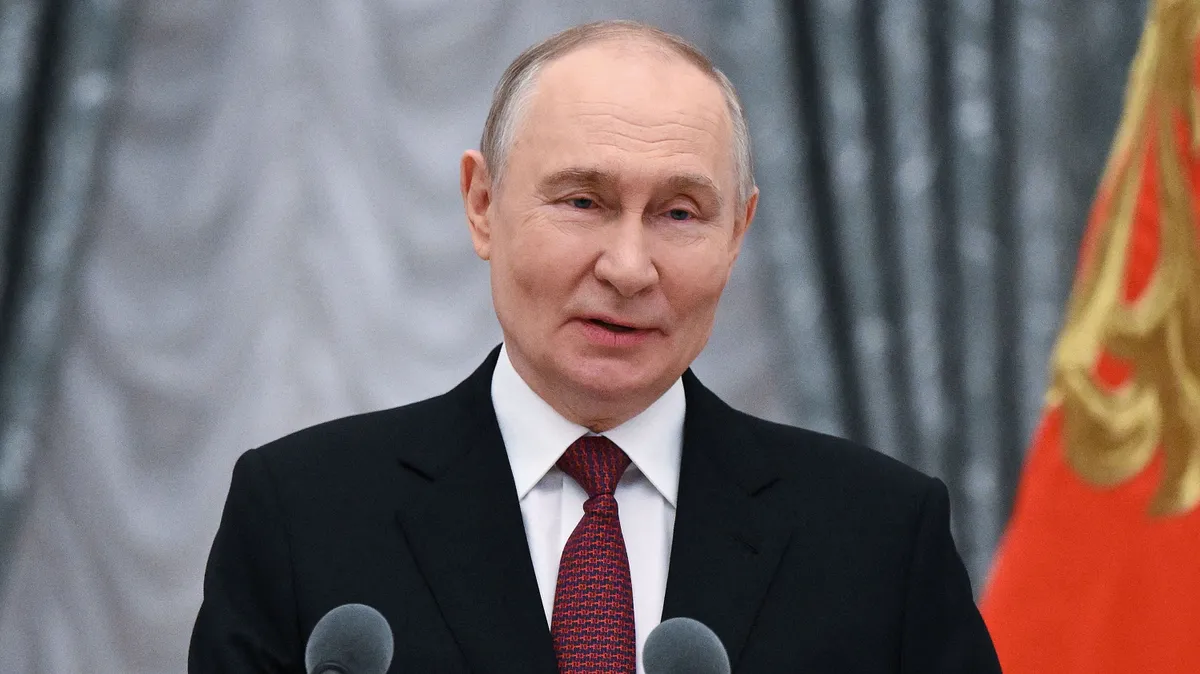 In this pool photograph distributed by the Russian state agency Sputnik, Russia's President Vladimir Putin gives a speech during a ceremony to present awards to young scientists at the Kremlin in Moscow on February 5, 2026. (Photo by Kristina Solovyova / POOL / AFP)