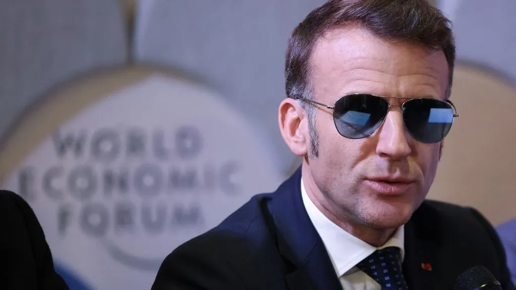France's President Emmanuel Macron delivers remarks during a meeting with leaders of AI companies during the World Economic Forum (WEF) annual meeting in Davos on January 20, 2026. The World Economic Forum takes place in Davos from January 19 to January 23, 2026. (Photo by Ludovic MARIN / AFP)