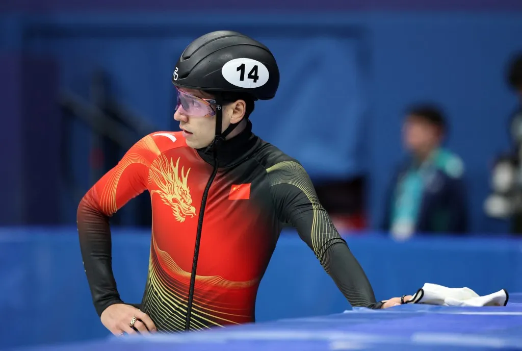 (260218) -- MILAN, Feb. 18, 2026 (Xinhua) -- Liu Shaoang of China reacts after the short track speed skating men's 500m final B at the Milan-Cortina 2026 Olympic Winter Games in Milan, Italy, Feb. 18, 2026. (Xinhua/Li Ming) (Photo by Li Ming / Xinhua via AFP)