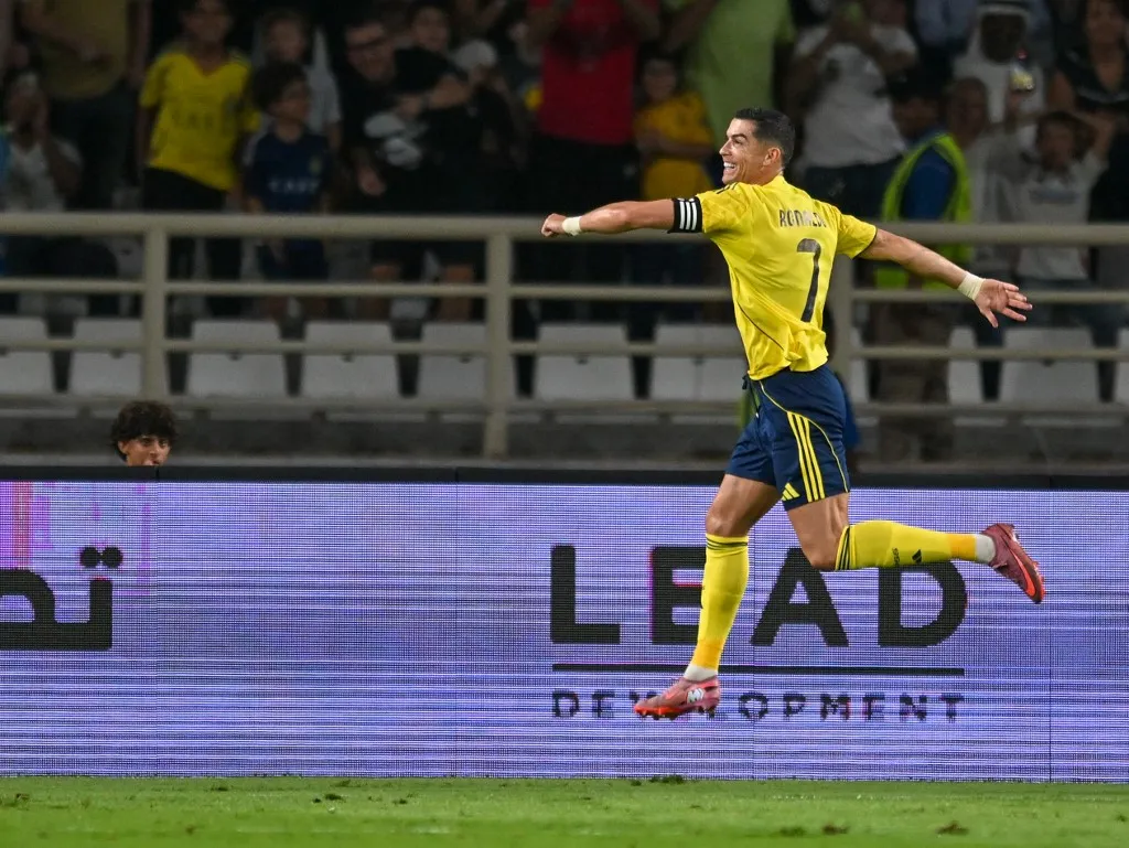 ABU DHABI, UNITED ARAB EMIRATES - DECEMBER 10: Cristiano Ronaldo of Al Nassr celebrates after scoring a goal during the friendly football match between Al Nassr and Al Wahda at Al Nahyan Stadium in Abu Dhabi, United Arab Emirates on December 10, 2025. Waleed Zein / Anadolu (Photo by Waleed Zein / Anadolu via AFP)