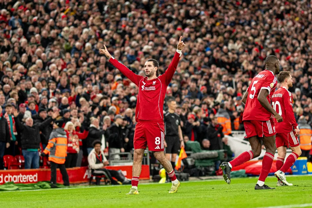 Dominik Szoboszlai of Liverpool salutes the fans after scoring during the Premier League match between Liverpool and Manchester City at Anfield in Liverpool, England, on February 8, 2026. (Photo by Steven Halliwell/MI News/NurPhoto) (Photo by MI News / NurPhoto via AFP)