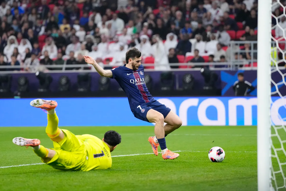 Khvicha Kvaratskhelia left winger of PSG and Georgia shooting to goal and scored during FIFA Intercontinental Cup 2025 Final match between Paris Saint-Germain FC and Flamengo at Ahmad Bin Ali Stadium on December 17, 2025 in Doha, Qatar.  (Photo by Jose Breton/Pics Action/NurPhoto) (Photo by Jose Breton / NurPhoto via AFP)