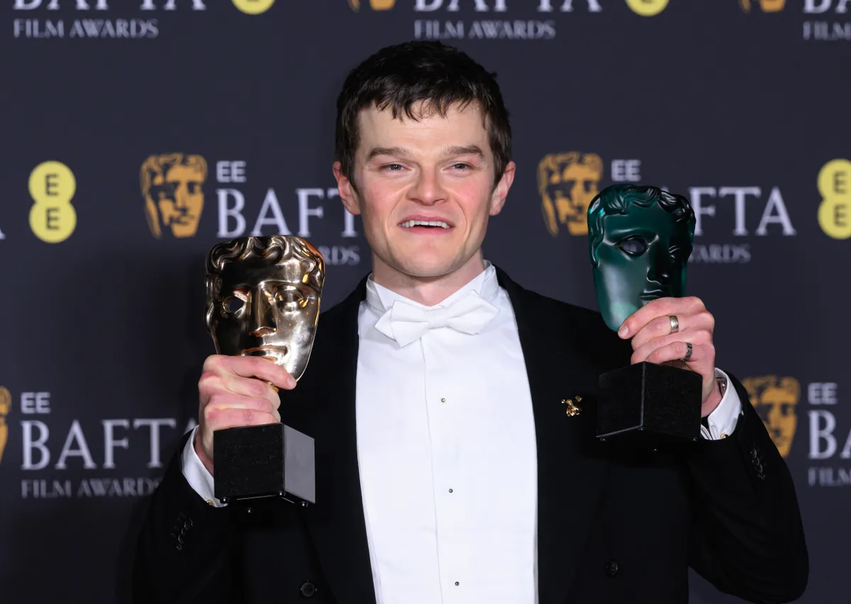 Robert Aramayo, with the Leading Actor and EE Rising Star awards for I Swear at the EE BAFTA Film Awards 2026, Royal Festival Hall. Credit: Doug Peters/EMPICS
