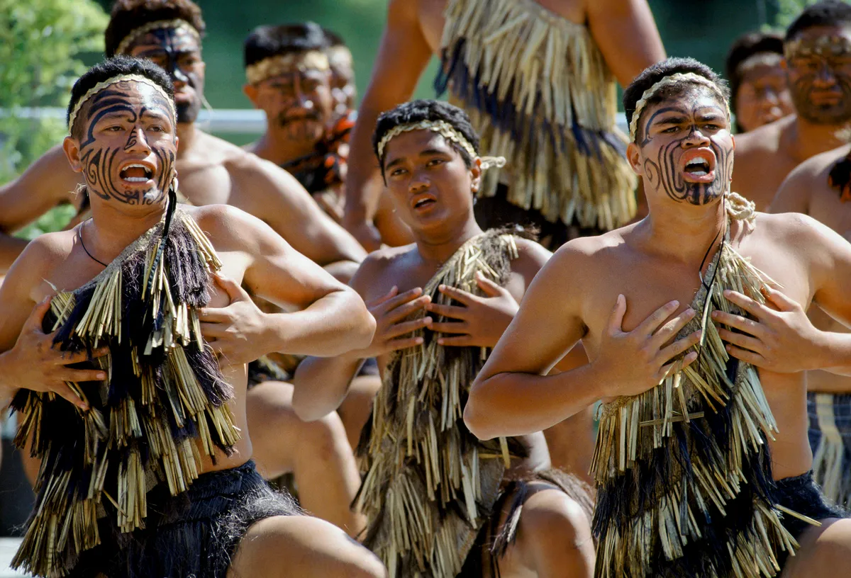 Maori warriors at a tribal gathering in New Zealand (Photo by TIM GRAHAM / Robert Harding Heritage / robertharding via AFP)