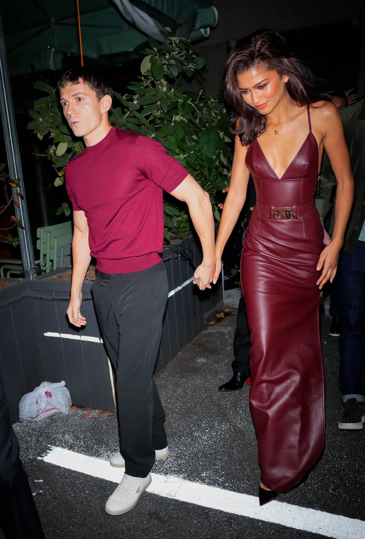 10/24/2024 Tom Holland and Zendaya are seen on a date night in New York City. Zendaya wore a burgundy leather dress and black heels. Tom wore a matching red t-shirt, dark trousers, and Prada sneakers.

sales@theimagedirect.com Please byline:TheImageDirect.com