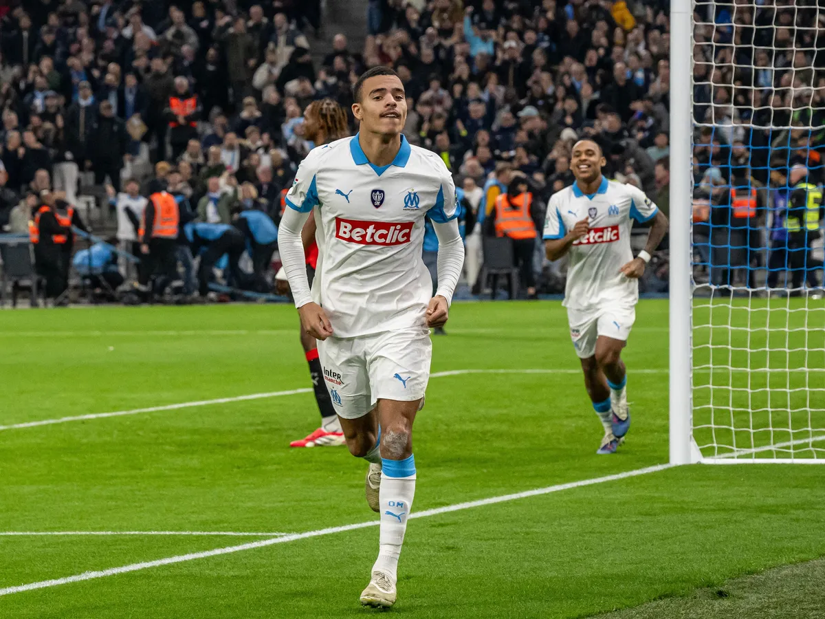 Marseille's English forward #10 Mason Greenwood celebrates scoring his team's second goal during the French Cup round of 16 football match between Olympique de Marseille (OM) and Stade Rennais at the Stade Velodrome in Marseille, southern France, on February 3, 2026. (Photo by MIGUEL MEDINA / AFP)
