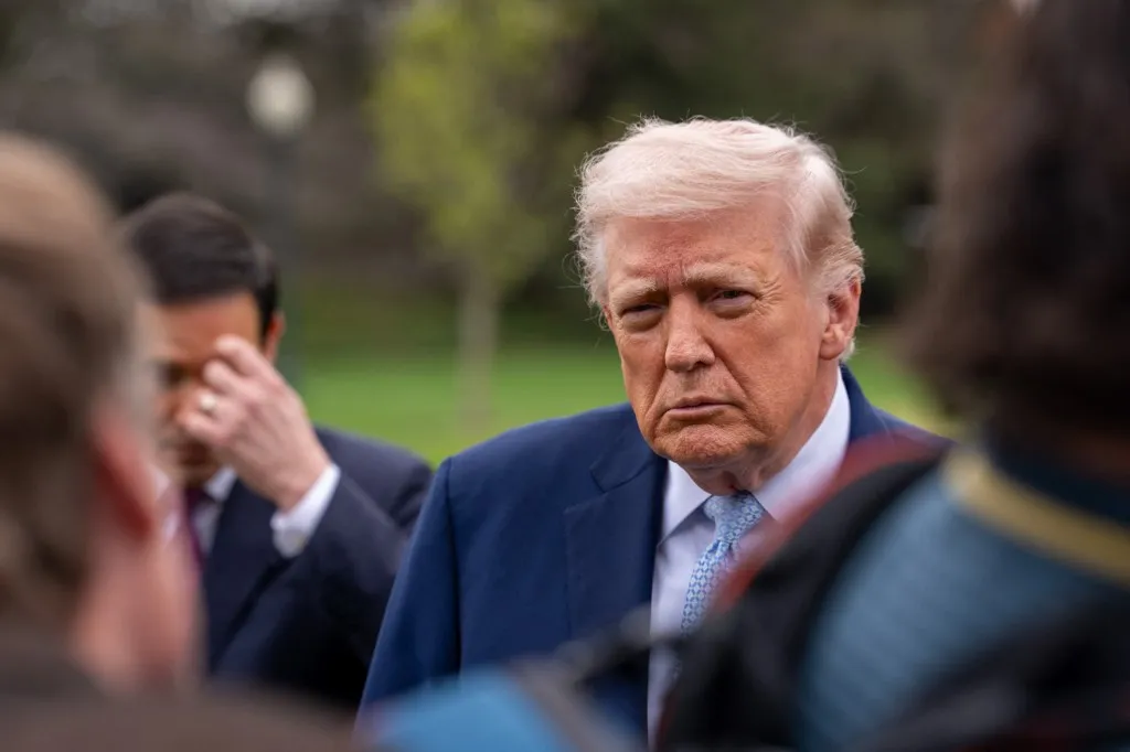 U.S. President Donald Trump speaks to members of the media on the South Lawn of the White House before boarding Marine One for a trip to Florida in Washington, D.C., on March 20, 2026. Secretary of State Marco Rubio joins the President. (Photo by Andrew Leyden/NurPhoto) (Photo by Andrew Leyden / NurPhoto via AFP)