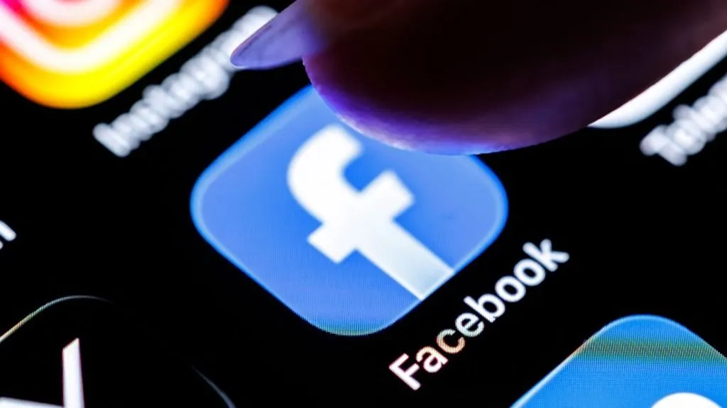 Meta, Facebook, 07 March 2026, Bavaria, Munich: The logo of the Facebook app can be seen on the display of a smartphone on March 7, 2026, while a finger taps on the application icon. Facebook is a social network (social media) operated by the US company Meta Platforms. (index finger, icon, symbol image, symbol photo, illustration, symbolic photo, illustrative photo, theme image, general image, theme photo) Photo: Matthias Balk/dpa (Photo by MATTHIAS BALK / dpa Picture-Alliance via AFP)