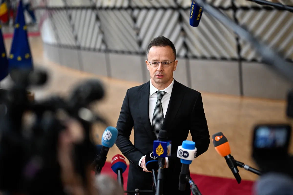 Szijjártó Péter, Hungary's Foreign Minister Peter Szijjarto speaks to the press as he arrives for the EU Foreign Affairs Council in Brussels on February 23, 2026. (Photo by JOHN THYS / AFP)