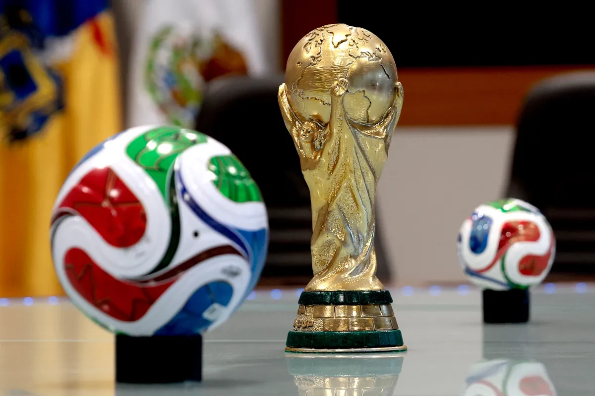 Replicas of the FIFA World Cup trophy and balls are seen at a government office in Tlajomulco de Zuniga, Jalisco state, Mexico on February 19, 2026. Guadalajara will host four matches from the FIFA World Cup, including Mexico's second group fixture against Korea Republic on June 18, 2026. (Photo by Ulises Ruiz / AFP)