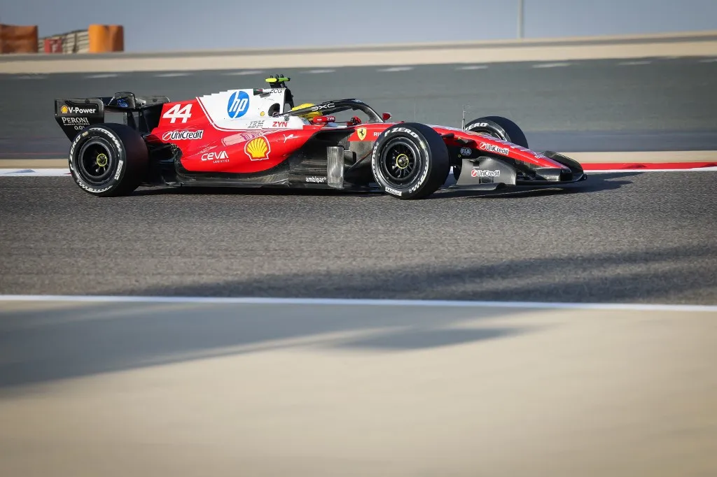SAKHIR, BAHRAIN - FEBRUARY 18: Lewis Hamilton of Ferrari drives on the second day of the Formula 1 pre-season testing event at the Bahrain International Circuit in Sakhir, Bahrain on February 19, 2026. Ayman Yaqoob / Anadolu (Photo by Ayman Yaqoob / Anadolu via AFP)