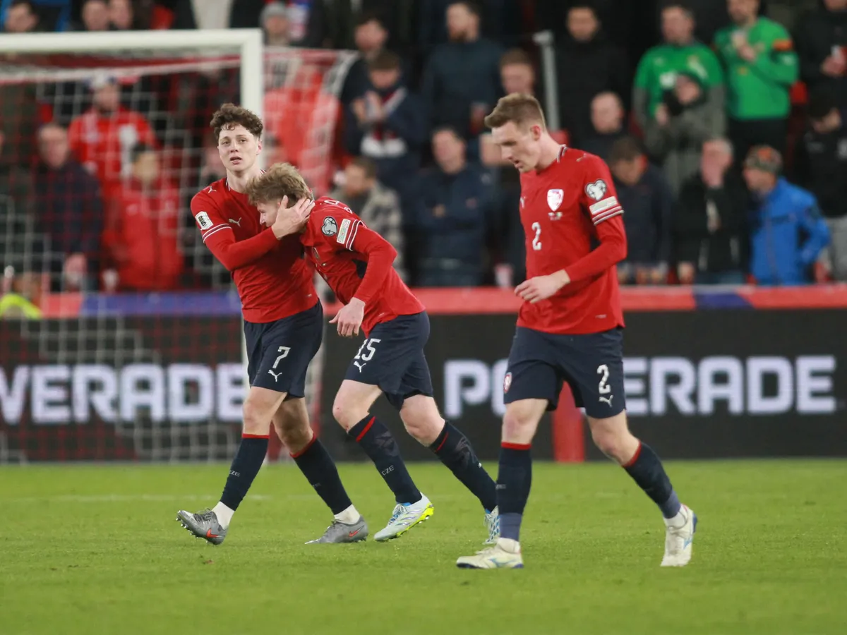 Czech Republic's defender #07 Ladislav Krejci (l) celebrates scoring during the FIFA World Cup 2026 European qualification semi final football match Czech Republic vs Ireland on March 26, 2026 in Prague. (Photo by MILAN KAMMERMAYER / AFP)