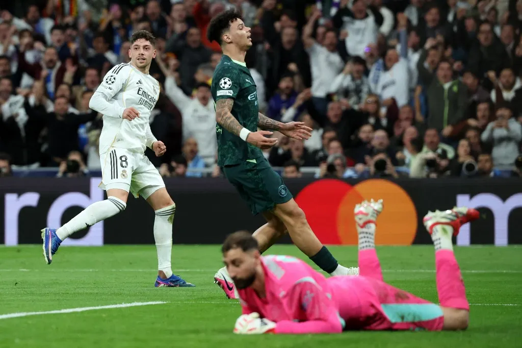 Real Madrid's Uruguayan midfielder #08 Federico Valverde celebrates scoring his second goal during the UEFA Champions League last 16 first leg football match between Real Madrid CF and Manchester City at Santiago Bernabeu Stadium in Madrid on March 11, 2026. (Photo by Pierre-Philippe MARCOU / AFP)