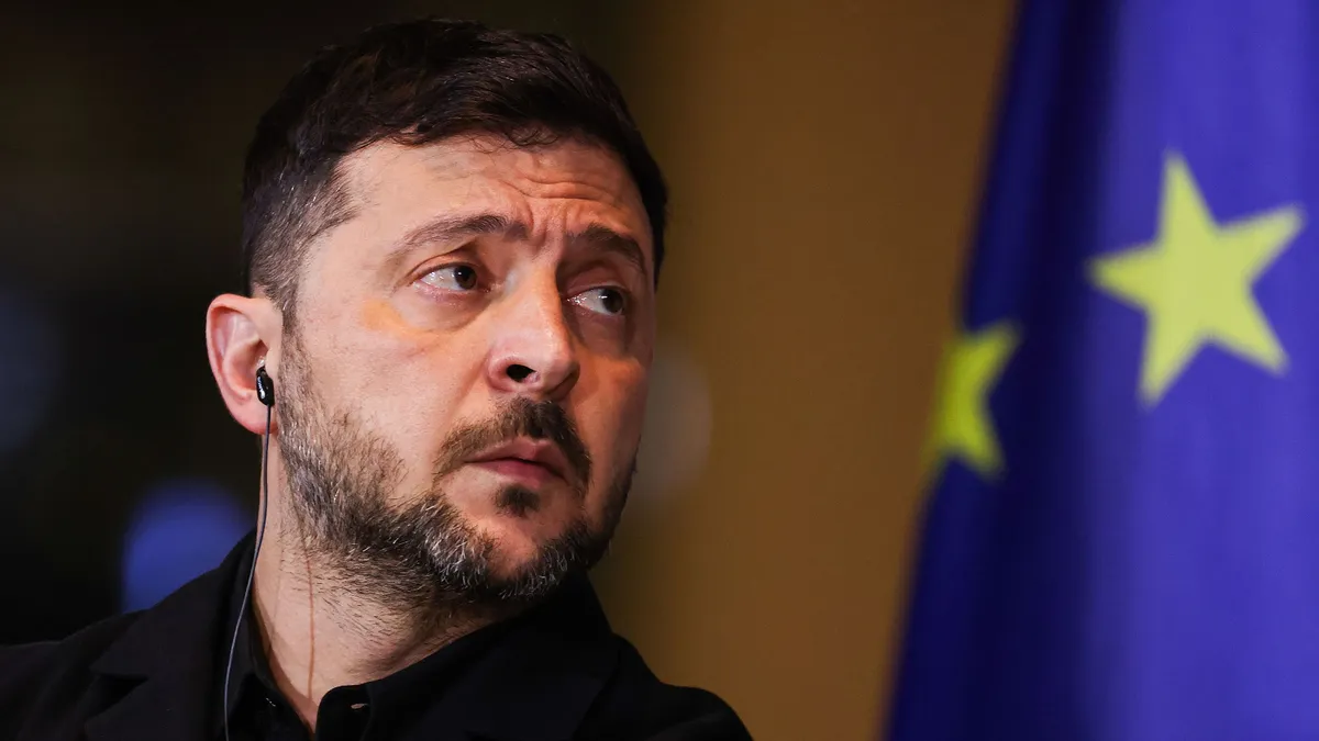Volodymyr Zelenskiy, Ukraine's president, during a news conference with Friedrich Merz, Germany's chancellor, at the Chancellery in Berlin, Germany, on Monday, Dec. 15, 2025. European officials are growing concerned that an emerging US-brokered peace deal in Ukraine could be exploited by Russia, paving the way for a re-invasion of territory in the war-battered nation's eastern Donbas region. Photographer: Krisztian Bocsi/Bloomberg via Getty Images