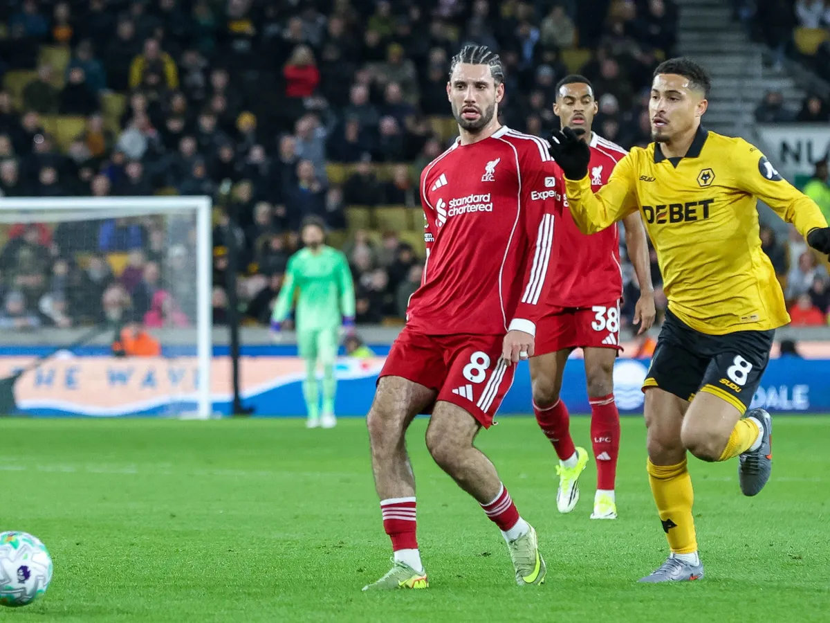 Dominik Szoboszlai of Liverpool FC and Joao Gomes of Wolverhampton Wanderers are in action during the Premier League match between Wolverhampton Wanderers and Liverpool at Molineux in Wolverhampton, on March 3, 2026. (Photo by Stuart Leggett/MI News/NurPhoto) (Photo by MI News / NurPhoto via AFP)