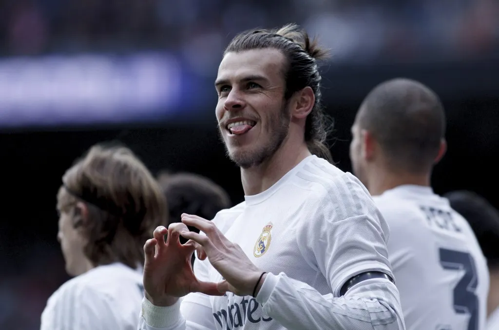 SPAIN, Madrid:Real Madrid's Welsh forward Gareth Bale Celebrates a goal during the Spanish League 2015/16 match between Real Madrid and Sporting Gijon, at Santiago Bernabeu Stadium in Madrid on January 17, 2016. (Photo by Guillermo Martinez) (Photo by Guillermo Martinez/NurPhoto) (Photo by Guillermo Martinez / NurPhoto via AFP)