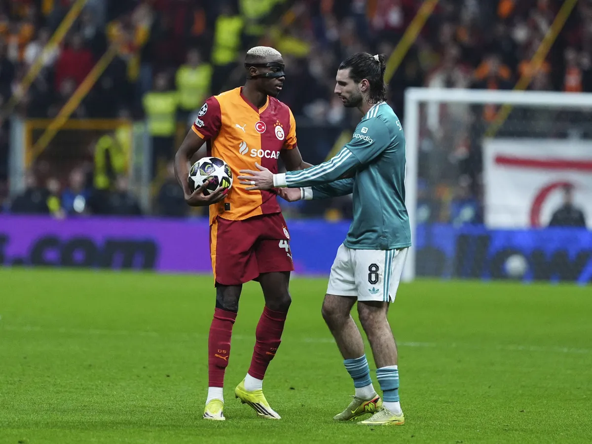 ISTANBUL, TURKIYE - MARCH 10: Victor Osimhen (45) of Galatasaray argues with Dominik Szoboszlai (8) of Liverpool during the UEFA Champions League round of 16 play-off first leg match between Galatasaray and Liverpool at RAMS Park in Istanbul, Turkiye, on March 10, 2026. Bunyamin Celik / Anadolu (Photo by Bunyamin Celik / Anadolu via AFP)