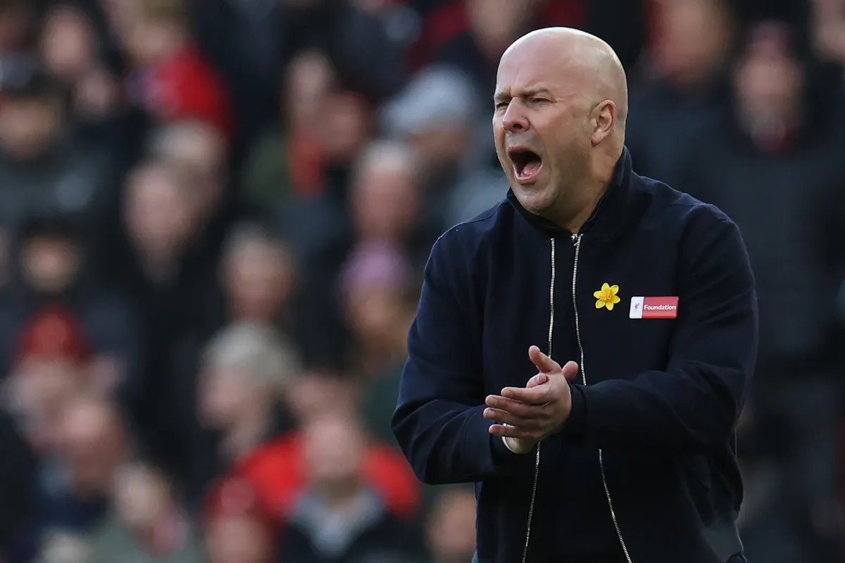 Liverpool's Dutch manager Arne Slot reacts during the English Premier League football match between Liverpool and Tottenham Hotspur at Anfield in Liverpool, north west England on March 15, 2026. (Photo by Darren Staples / AFP) / RESTRICTED TO EDITORIAL USE. No use with unauthorized audio, video, data, fixture lists, club/league logos or 'live' services. Online in-match use limited to 120 images. An additional 40 images may be used in extra time. No video emulation. Social media in-match use limited to 120 images. An additional 40 images may be used in extra time. No use in betting publications, games or single club/league/player publications. / 