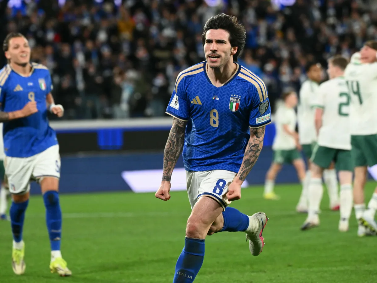Italy's midfielder #08 Sandro Tonali celebrates scoring his team's first goal during the play-off FIFA World Cup 2026 European qualification semi-final football match between Italy and North Ireland at the Gewiss stadium in Bergamo, on March 26, 2026. (Photo by Alberto PIZZOLI / AFP)