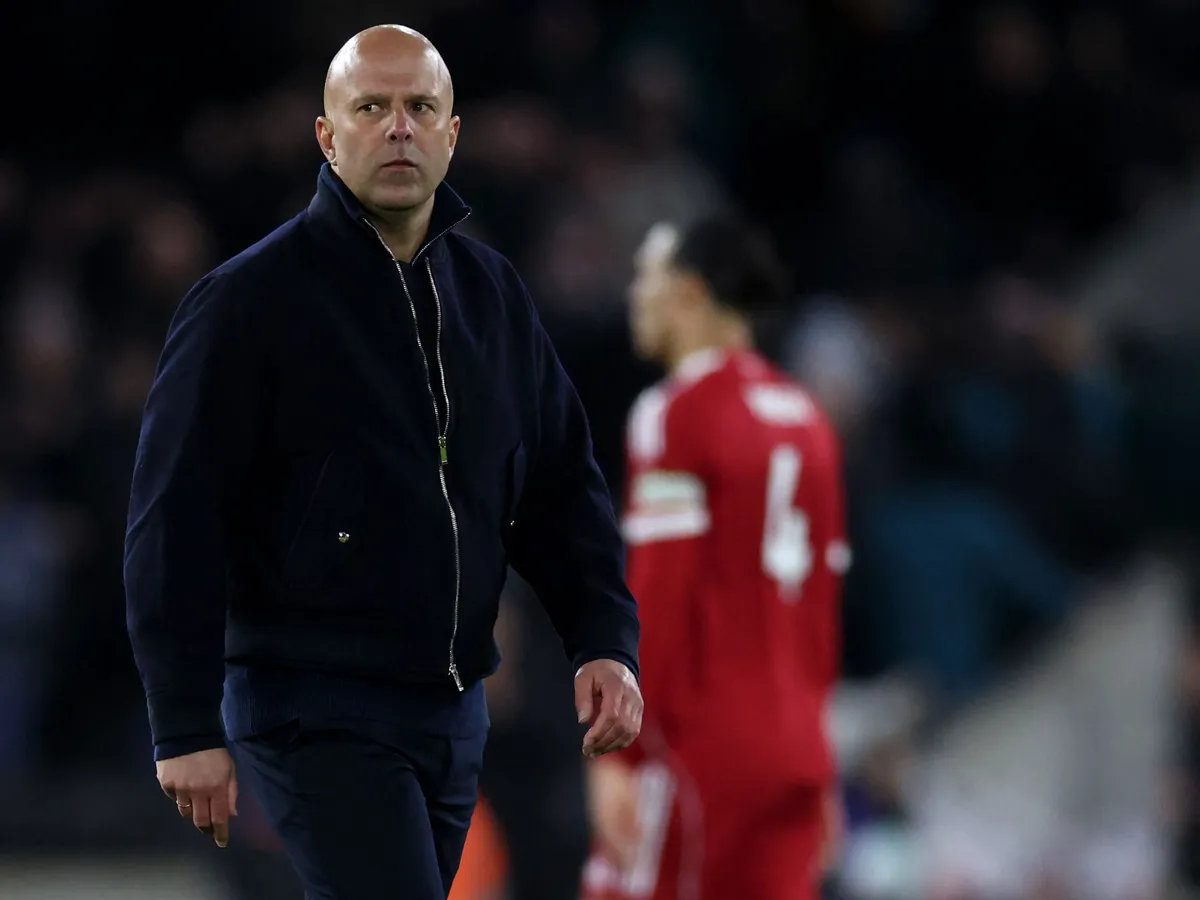 Liverpool's Dutch manager Arne Slot looks on after the English Premier League football match between Wolverhampton Wanderers and Liverpool at the Molineux stadium in Wolverhampton, central England on March 3, 2026. The match ended Wolverhampton Wanderers 2 Liverpool 1 (Photo by Darren Staples / AFP) / RESTRICTED TO EDITORIAL USE. No use with unauthorized audio, video, data, fixture lists, club/league logos or 'live' services. Online in-match use limited to 120 images. An additional 40 images may be used in extra time. No video emulation. Social media in-match use limited to 120 images. An additional 40 images may be used in extra time. No use in betting publications, games or single club/league/player publications. / 