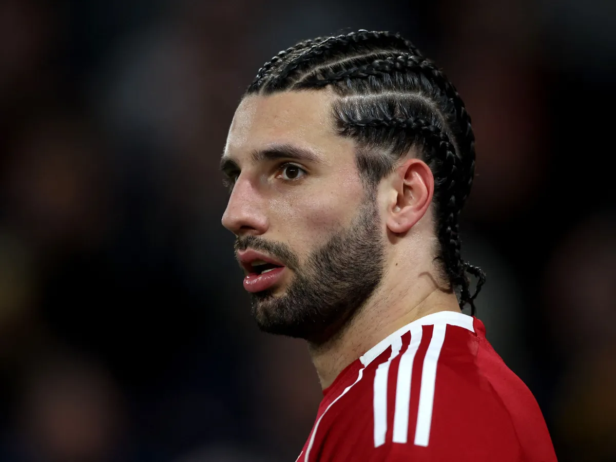 Liverpool's Hungarian midfielder #08 Dominik Szoboszlai looks on during the English Premier League football match between Wolverhampton Wanderers and Liverpool at the Molineux stadium in Wolverhampton, central England on March 3, 2026. (Photo by Darren Staples / AFP) / RESTRICTED TO EDITORIAL USE. No use with unauthorized audio, video, data, fixture lists, club/league logos or 'live' services. Online in-match use limited to 120 images. An additional 40 images may be used in extra time. No video emulation. Social media in-match use limited to 120 images. An additional 40 images may be used in extra time. No use in betting publications, games or single club/league/player publications. /