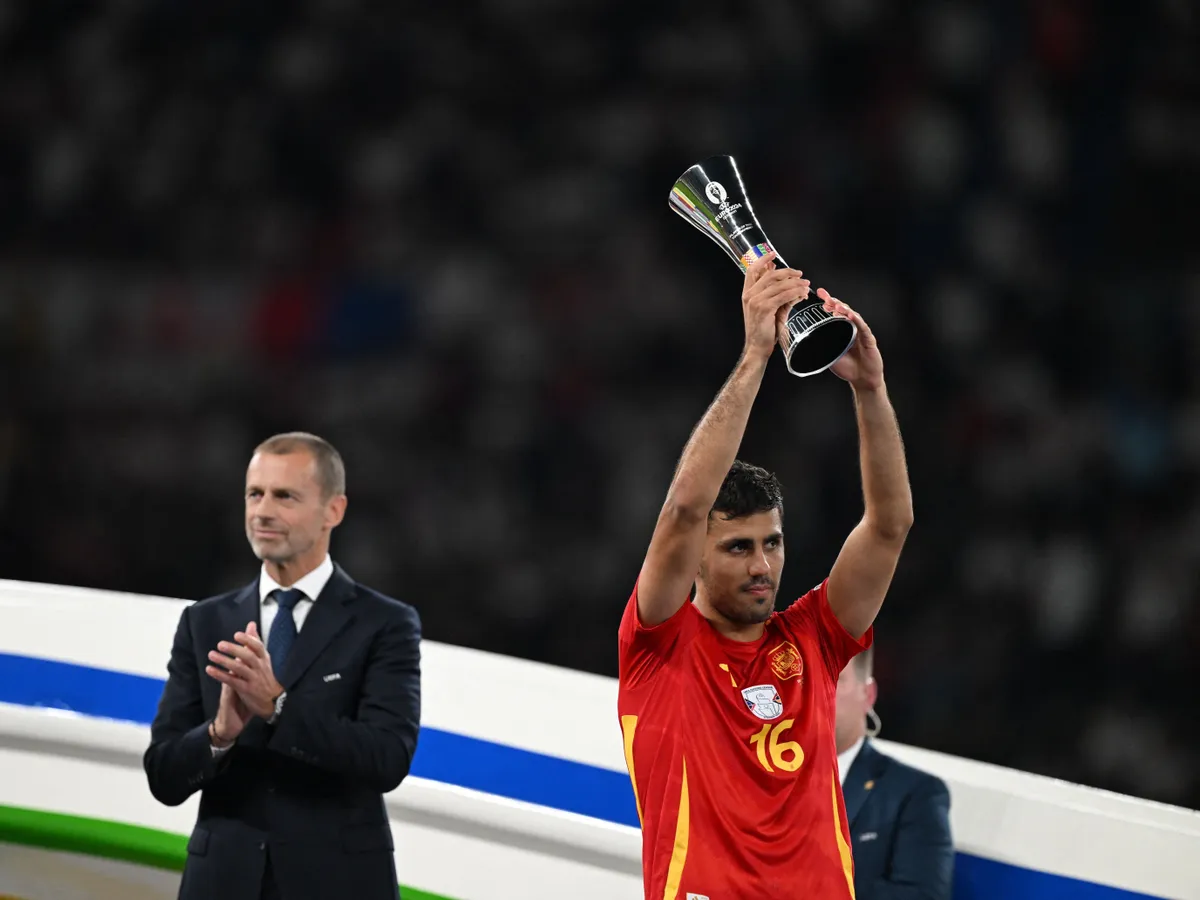 BERLIN, GERMANY - JULY 14: Rodri wins Player of the Tournament celebrates championship after winning the UEFA EURO 2024 final match between Spain and England at Olympiastadion in Berlin, Germany on July 14, 2024. Hesham Elsherif / Anadolu (Photo by Hesham Elsherif / Anadolu via AFP)