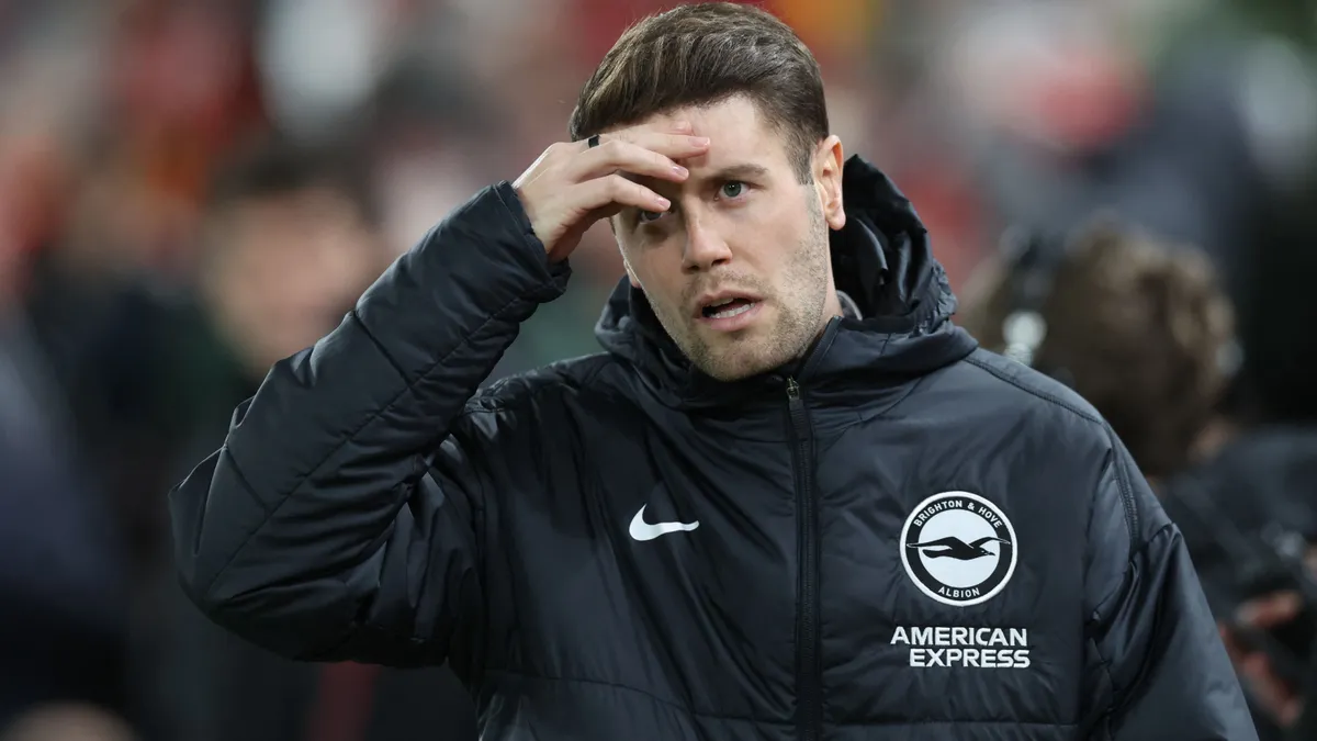 Brighton's German head coach Fabian Hurzeler arrives ahead of kick-off in the English FA Cup fourth round football match between Liverpool and Brighton and Hove Albion at Anfield in Liverpool, north west England on February 14, 2026. (Photo by Darren Staples / AFP) / RESTRICTED TO EDITORIAL USE. No use with unauthorized audio, video, data, fixture lists, club/league logos or 'live' services. Online in-match use limited to 120 images. An additional 40 images may be used in extra time. No video emulation. Social media in-match use limited to 120 images. An additional 40 images may be used in extra time. No use in betting publications, games or single club/league/player publications. /