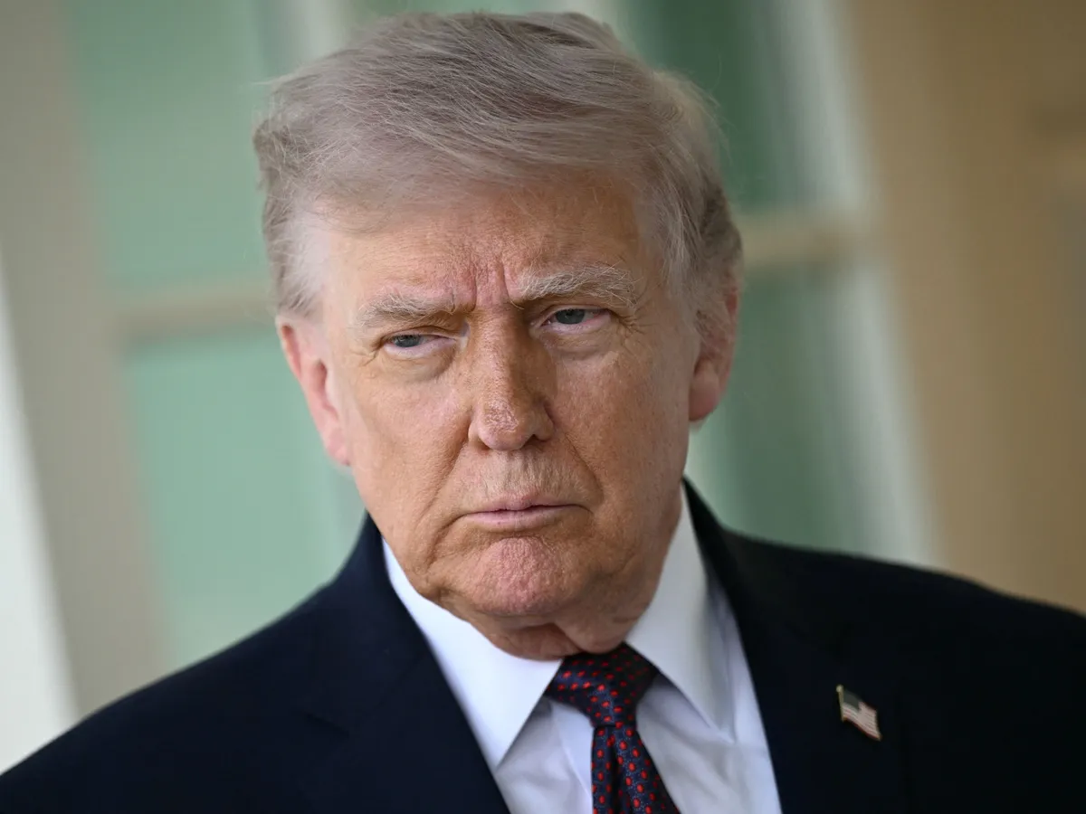 US President Donald Trump speaks to the press outside the Oval Office at the White House in Washington, DC, on April 13, 2026. Trump refused to apologize Monday for criticizing Pope Leo XIV, after the pontiff called for an end to violence in the Iran war. "There's nothing to apologize for. He's wrong," Trump told reporters, a day after a social media post and comments slamming the US-born pope. (Photo by Brendan SMIALOWSKI / AFP), spirit