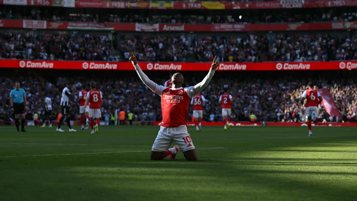 Arsenal's English midfielder #10 Eberechi Eze celebrates scoring the opening goal during the English Premier League football match between Arsenal and Newcastle United at the Emirates Stadium in London on April 25, 2026. (Photo by Glyn KIRK / AFP) / RESTRICTED TO EDITORIAL USE. No use with unauthorized audio, video, data, fixture lists, club/league logos or 'live' services. Online in-match use limited to 120 images. An additional 40 images may be used in extra time. No video emulation. Social media in-match use limited to 120 images. An additional 40 images may be used in extra time. No use in betting publications, games or single club/league/player publications. / 