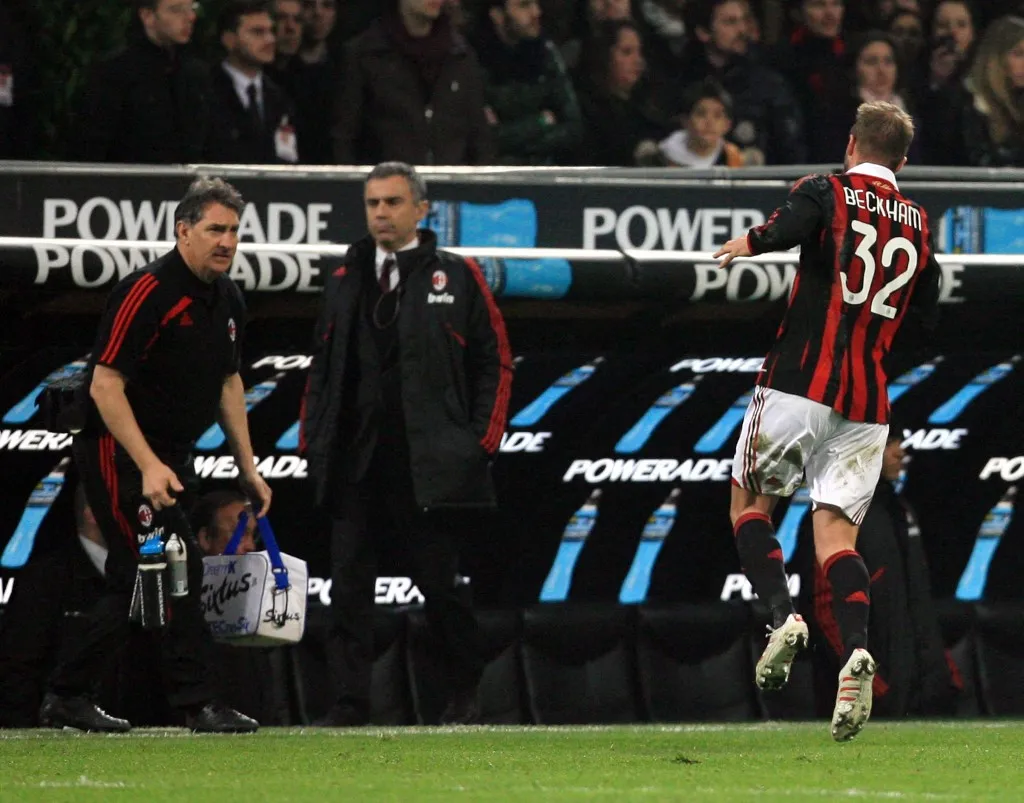 AC Milan's English midfielder David Beckham limps off the field after injuring his ankle during the Italian Serie A football match AC Milan against Chievo on March 14, 2010 at San Siro Stadium in Milan. Beckham twisted his left ankle during the final minutes of an AC Milan Serie A game against Chievo at the San Siro and limped off the field before being stretchered away in pain and in tears. The surgeon who operated on David Beckham's ruptured Achilles tendon in Finland on March 15, 2010 ruled out any possibility of the England star recovering in time for the World Cup. AFP PHOTO / FABRIZIO FORTE (Photo by Fabrizio Forte / AFP)