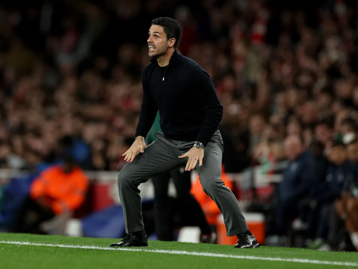 Arsenal's Spanish manager Mikel Arteta shouts instructions to the players from the touchline during the UEFA Champions League quarter-final, second-leg football match between Arsenal and Sporting Lisbon at the Emirates Stadium in north London on April 15, 2026. (Photo by Adrian Dennis / AFP)