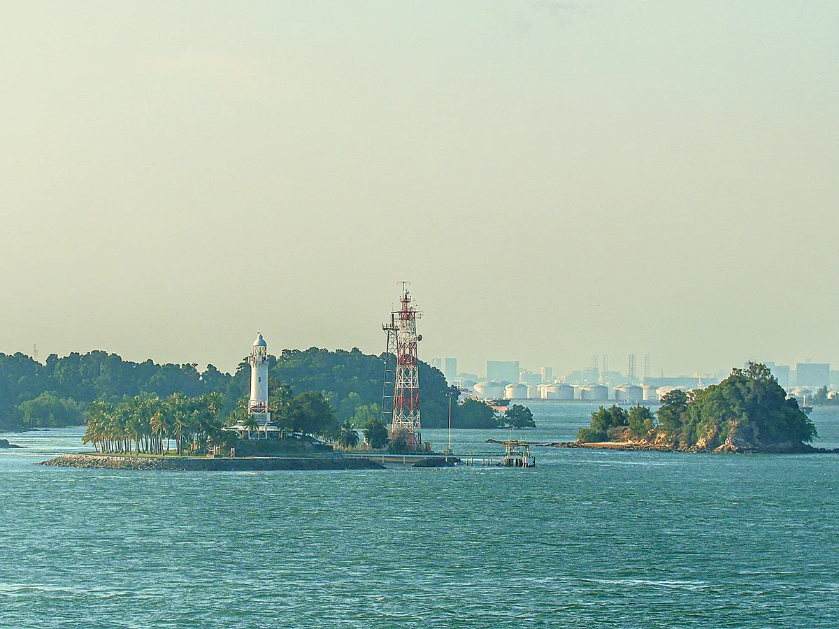 STRAIT OF MALACCA, SINGAPORE-JUNE 2024 - A number of cargo ships sail in the Strait of Malacca on 01, June 2024 in Singapore.