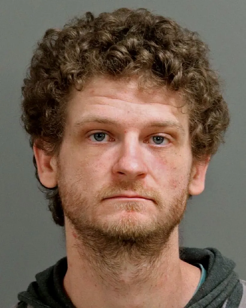 RALEIGH, NC - APRIL 8: (EDITOR'S NOTE: This handout image was provided by a third-party organization and may not adhere to Getty Images' editorial policy.) In this handout photo provided by the Raleigh Police Department, Ethan Jamieson poses for a police booking photo on April 8, 2026 in Raleigh, North Carolina.   Raleigh Police Department via Getty Images/AFP FOR EDITORIAL USE ONLY (Photo by Handout / GETTY IMAGES NORTH AMERICA / Getty Images via AFP)