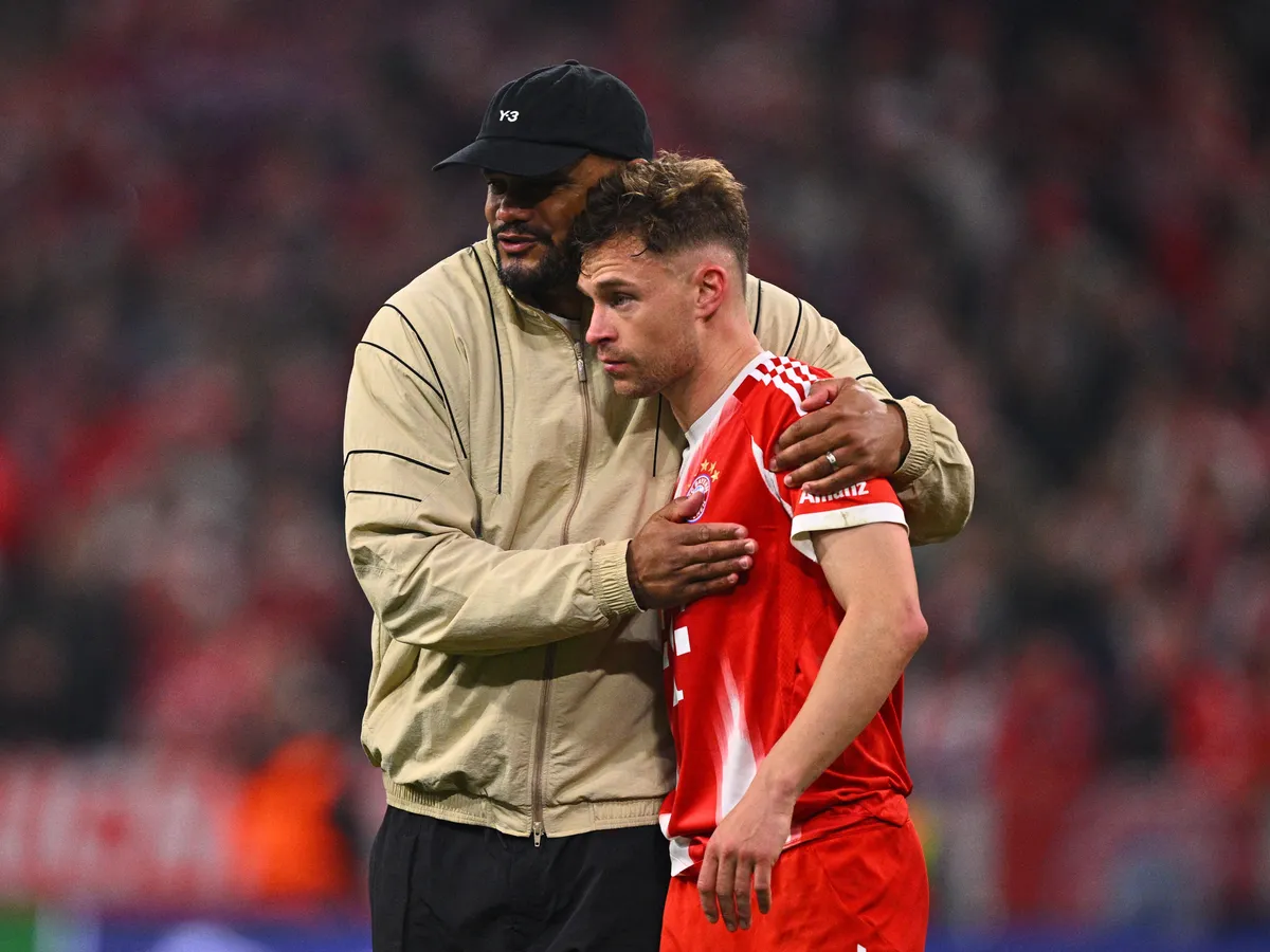15 April 2026, Bavaria, Munich: Soccer, Men: Champions League, Bayern Munich - Real Madrid, knockout round, quarter-finals, second leg, Allianz Arena, Coach Vincent Kompany (Bayern Munich) and Joshua Kimmich (Bayern Munich) embrace after the match. Photo: Tom Weller/dpa (Photo by Tom Weller / dpa Picture-Alliance via AFP)