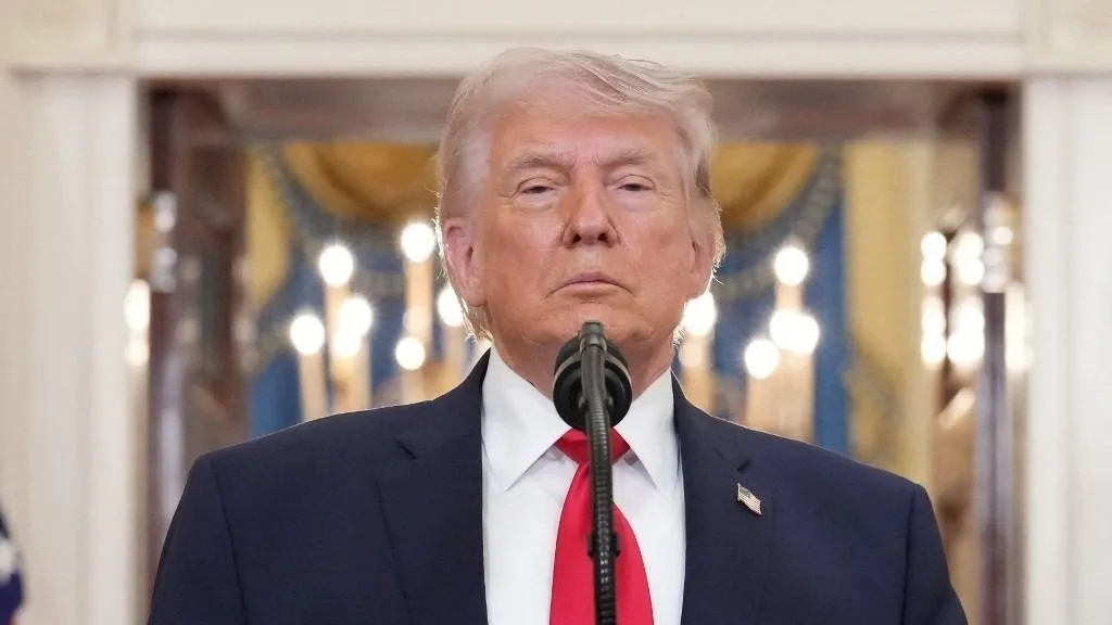 US President Donald Trump pauses as he finishes speaking during a televised address on the conflict in the Middle East from the Cross Hall of the White House in Washington, DC on April 1, 2026. President Donald Trump made his case for attacking Iran in his first nationwide address more than a month into the war, insisting the United States was close to victory as his approval rating sinks. In an evening speech from the White House, Trump broke little new ground on how the war would end and vowed two to three weeks further of "extremely hard" strikes against Iran. (Photo by Alex Brandon / POOL / AFP)