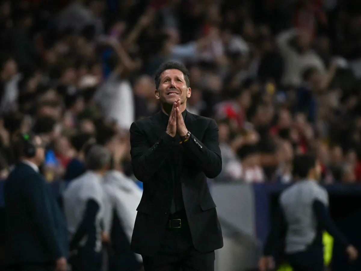 Atletico Madrid's Argentine coach Diego Simeone gestures after his team scored their first goal during the UEFA Champions League semi-final first leg football match between Club Atletico de Madrid and Arsenal at the Metropolitano stadium in Madrid on April 29, 2026. (Photo by Javier SORIANO / AFP)