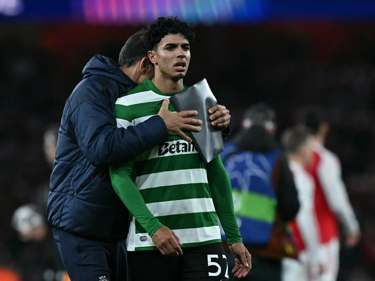 Sporting Lisbon's Portuguese midfielder #52 Joao Simoes reacts after the UEFA Champions League quarter-final, second-leg football match between Arsenal and Sporting Lisbon at the Emirates Stadium in north London on April 15, 2026. (Photo by Ben STANSALL / AFP)
