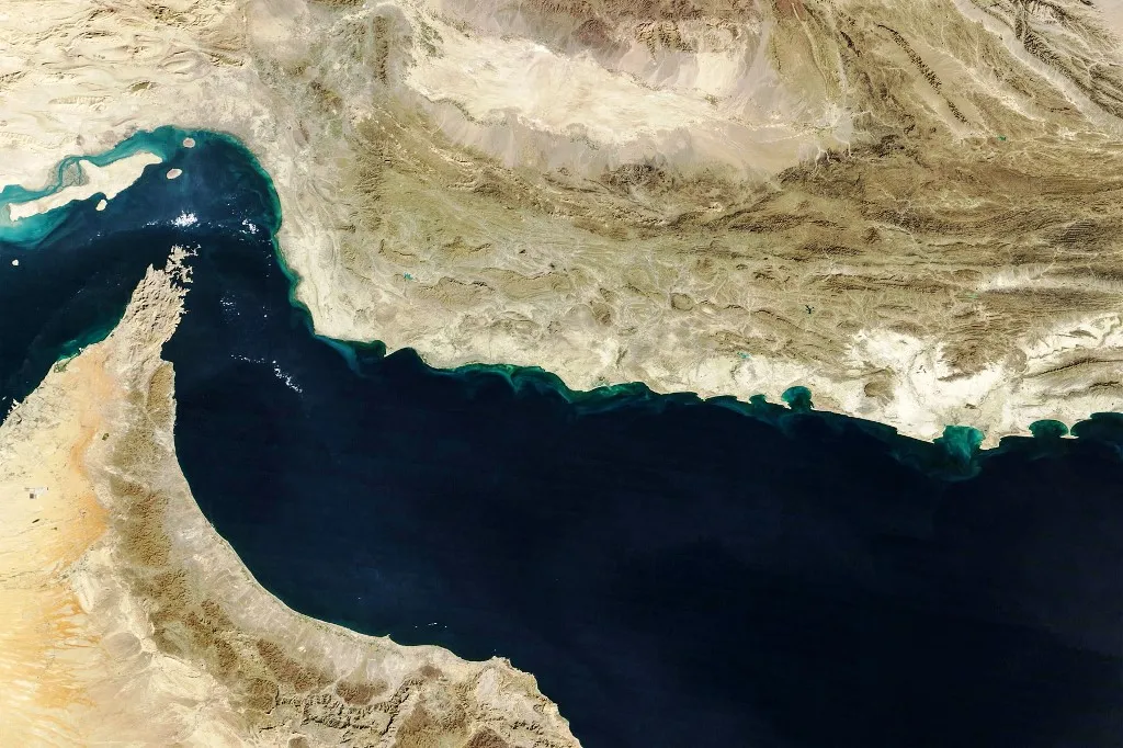 (FILES) This handout natural-colour image acquired with MODIS on NASAs Terra satellite taken on February 5, 2025 shows the Gulf of Oman and the Makran region (C) in southern Iran and southwestern Pakistan, and the Strait of Hormuz (L) and the northern coast of Oman (bottom). The US military said it would begin a blockade of all Iranian ports on April 13, 2026, after talks between the warring sides in Pakistan collapsed with the US President blaming Iran's refusal to abandon its nuclear ambitions. (Photo by NASA Earth Observatory / AFP) / RESTRICTED TO EDITORIAL USE - MANDATORY CREDIT "AFP PHOTO / NASA)" - NO MARKETING NO ADVERTISING CAMPAIGNS - DISTRIBUTED AS A SERVICE TO CLIENTS