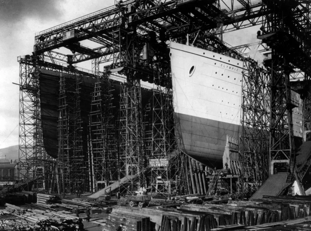 OLYMPIC and TITANIC - view of bows [in shipyard construction scaffolding] Date Created/Published: [between 1909 and 1911] Medium: 1 photographic print. (Photo by Ann Ronan Picture Library / Photo12 via AFP)